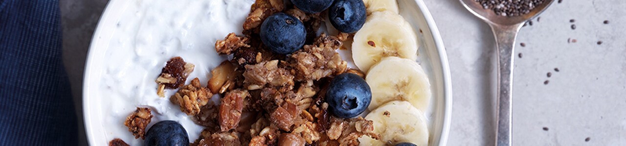 Bowl of Berries with Banana, Granola and Chia Seeds