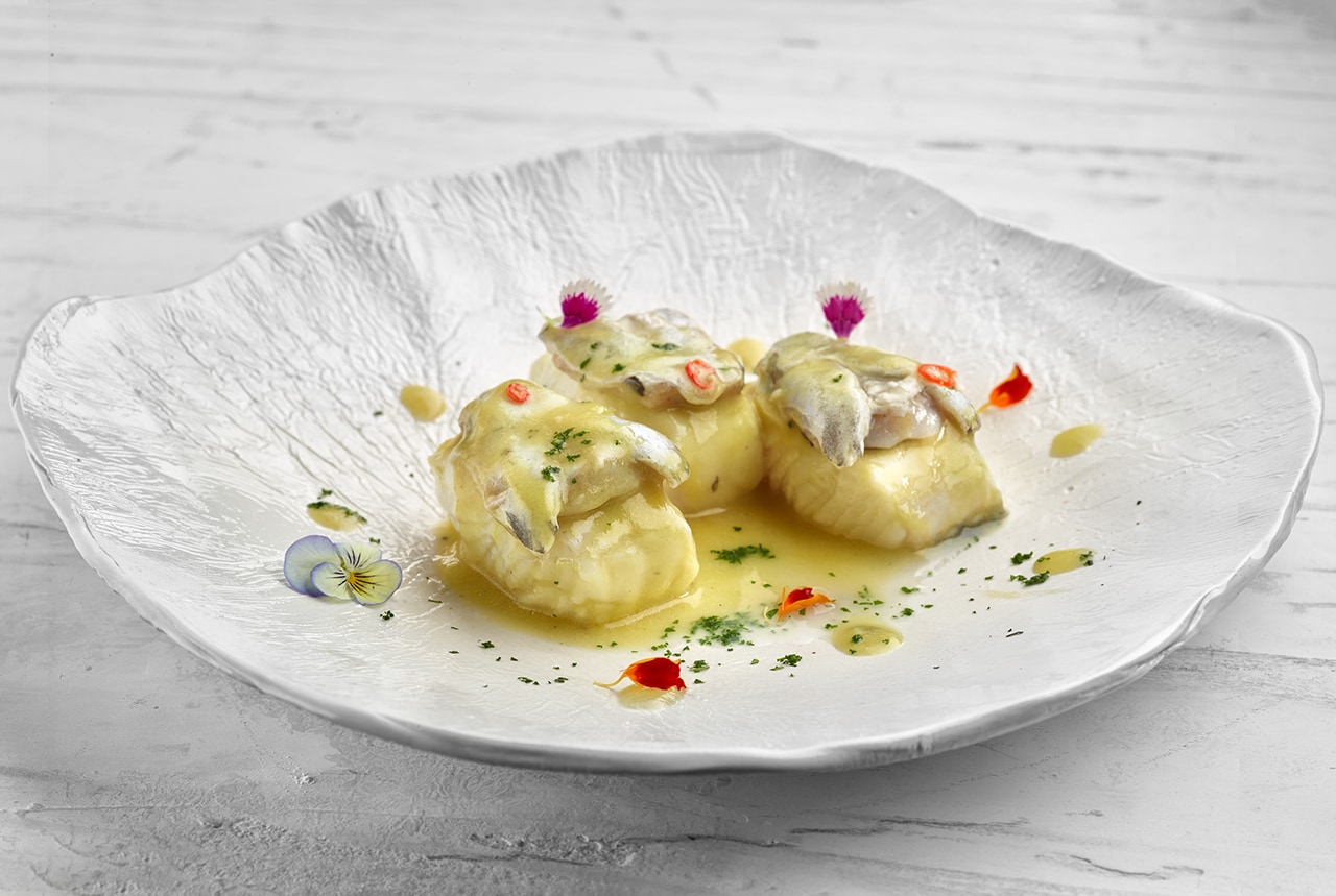 Merluza al pil pil con kokotxas