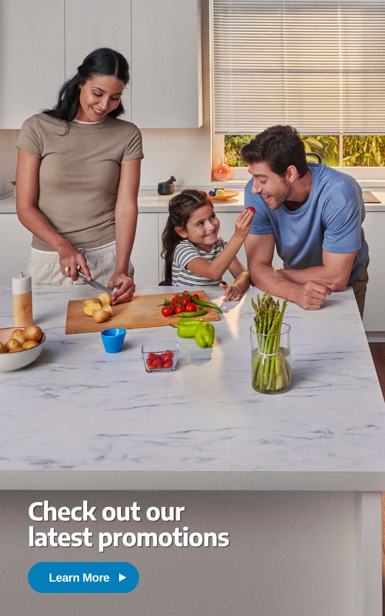 Check Out Our Latest Promotions with image of family in a kitchen