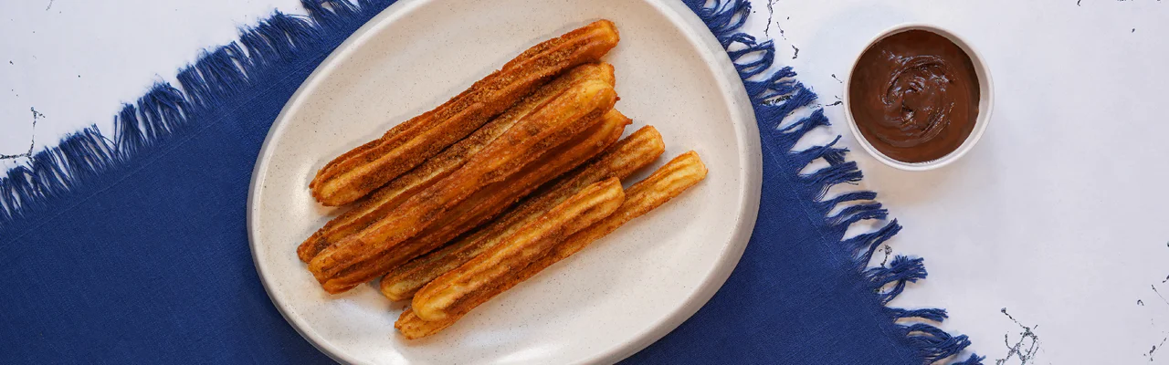 تحلية إسبانية لذيذة ومقرمشة تحلية إسبانية لذيذة ومقرمشة